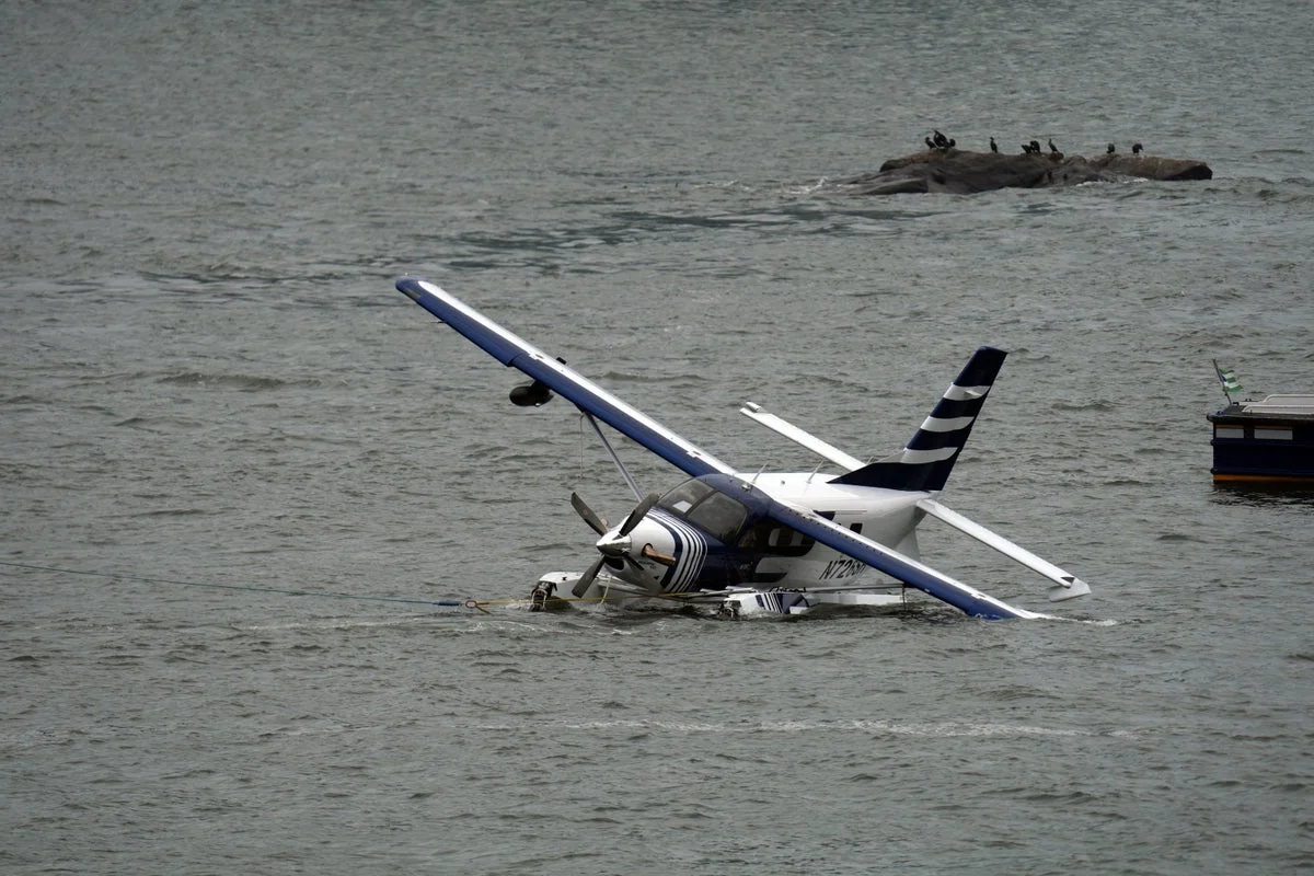 Eight people rescued after seaplane comes down in East River off New York City