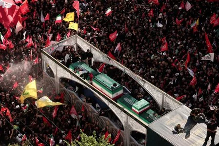 Iran says it hits US military targets in Gulf, lays slain leader to rest