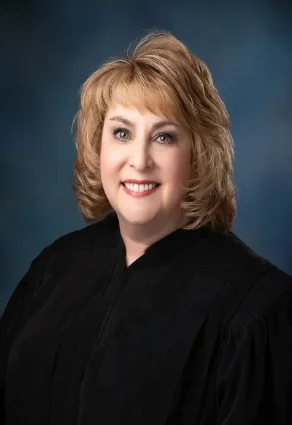 Judge Ellen M. Creel ultimately postponed the case until November