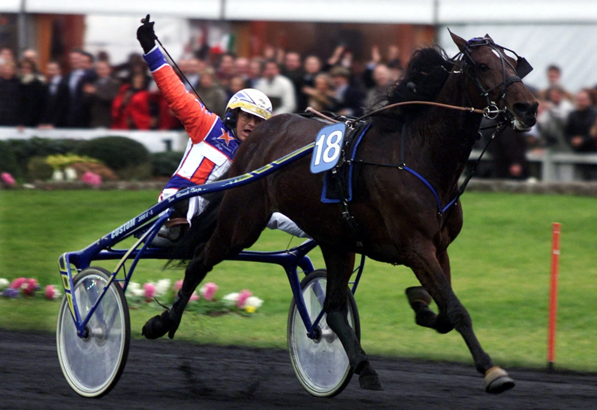 Italian driver Gianpolo Minnucci and Italian horse Varenne speed to the finish line to win Minnucci's second Prix d'Amerique in a row, at Vincennes horse track outside Paris January 27, 2002